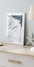 Grey Seagull Flying Over Waves Plakat - Posterbox.dk
